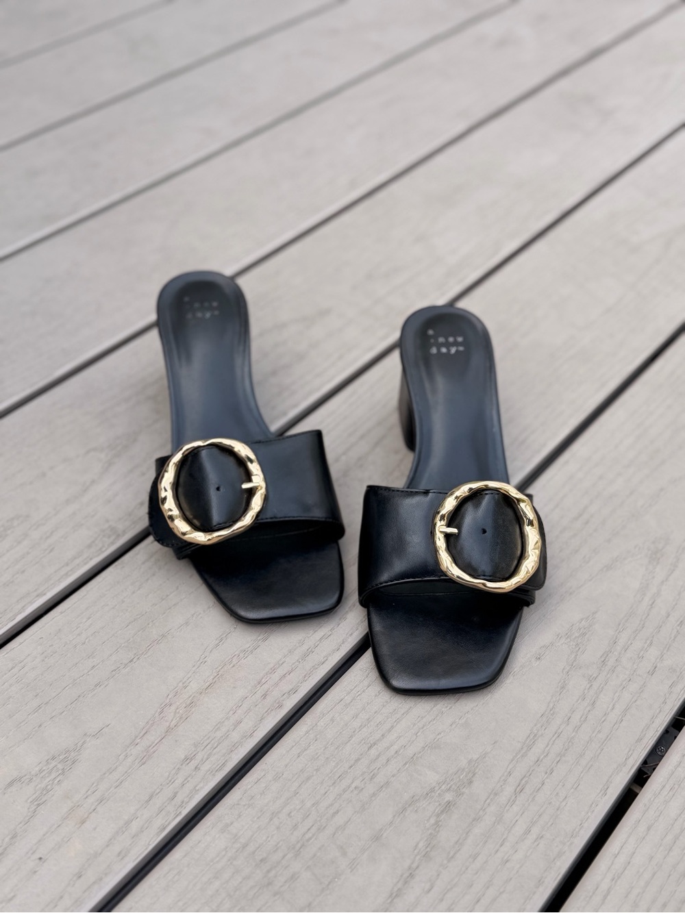 a new day Black Slide Mules with Gold Buckle